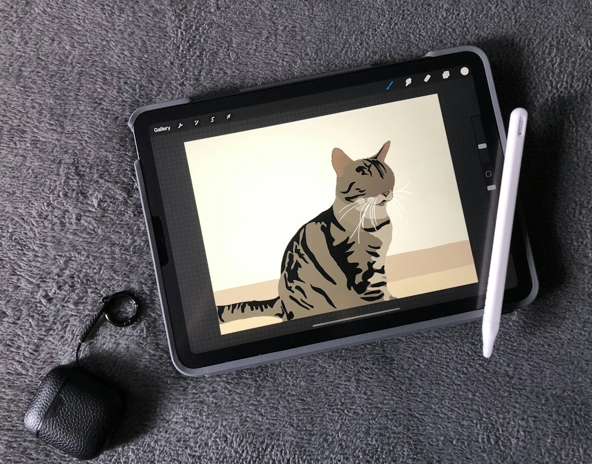 猫のイラストを描いたタブレット